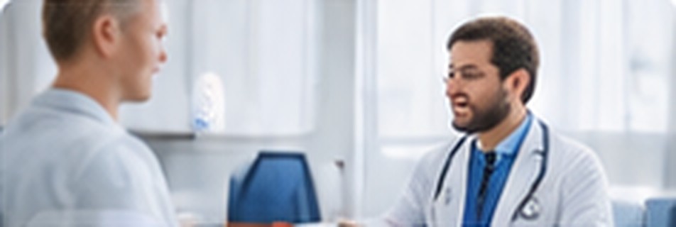 Doctor speaking with a patient